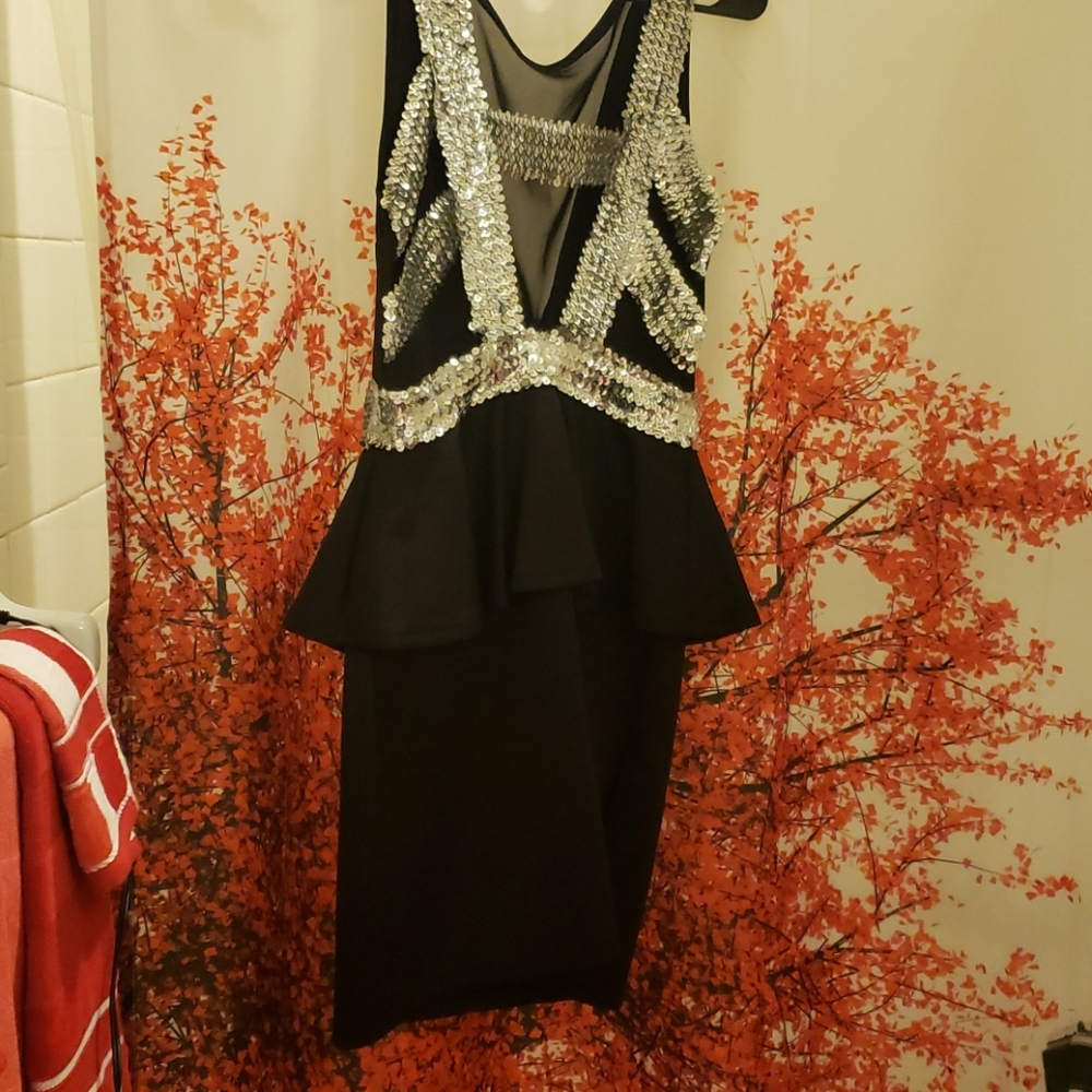 A DRESS AND A PANTS SUIT